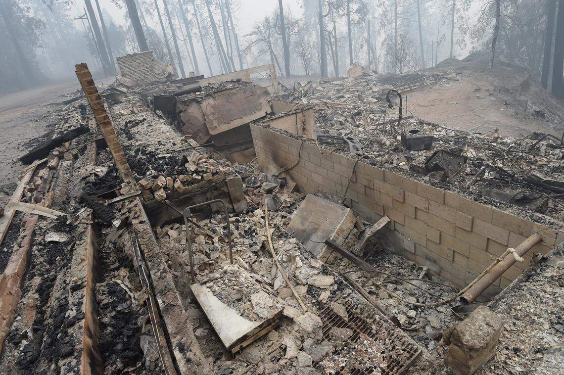 The fire-gutted ruins of a home at Meadow Lakes, Sept. 12, 2020.