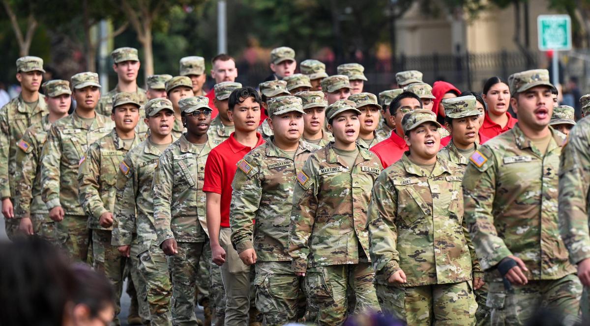 Members of the Fresno State Army ROTC march together during the 105th annual Central Valley Veterans Day Parade in downtown Fresno on Monday, Nov. 11, 2024.