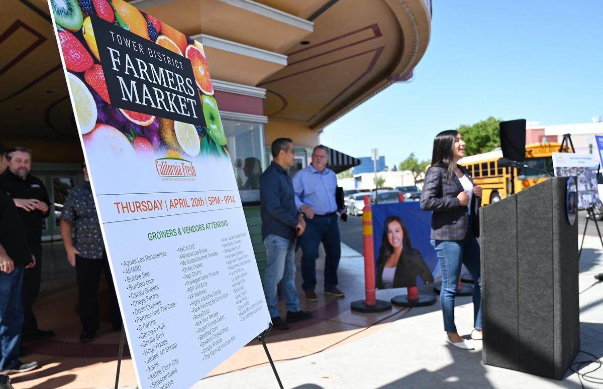 Fresno City Councilmember Annalisa Perea, right, announces the new Tower District Farmers Market to be held weekly starting April 20 on Olive Avenue during a press conference Wednesday, April 19, 2023 in Fresno.