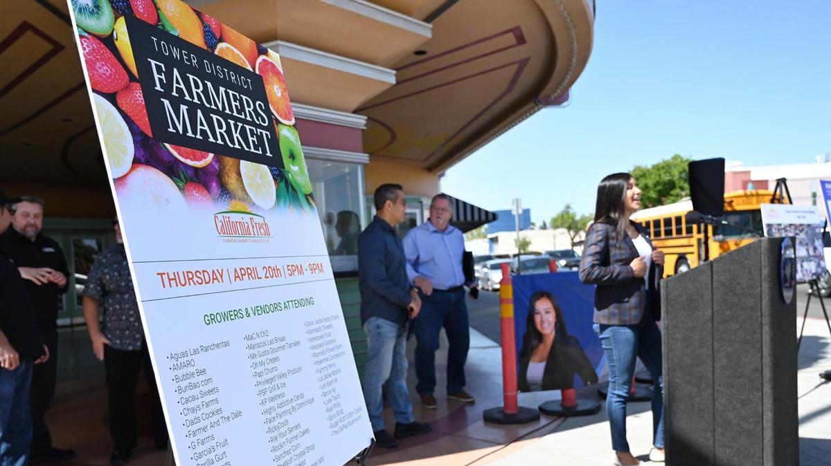 Fresno City Councilmember Annalisa Perea, right, announces the new Tower District Farmers Market to be held weekly starting April 20 on Olive Avenue during a press conference Wednesday, April 19, 2023 in Fresno.