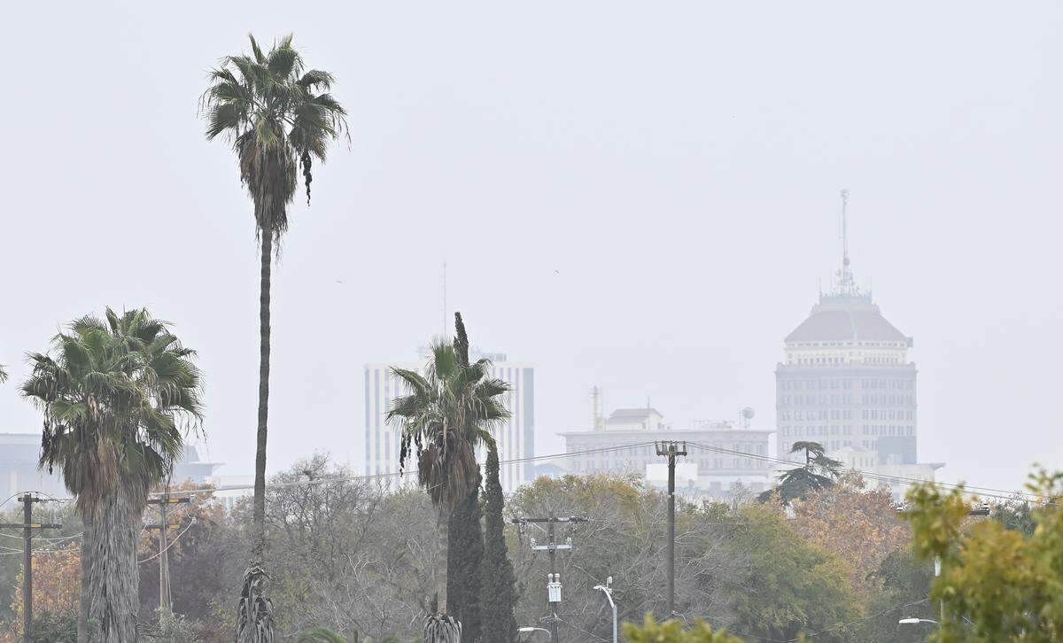 The downtown Fresno skyline is shrouded in gray Wednesday morning, Dec. 3, 2025. 