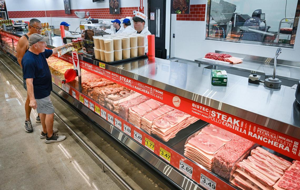 Shoppers get assistance at the meat counter at the new El Super supermarket on the north end of Manchester Center in Fresno on Wednesday, June 25, 2025.