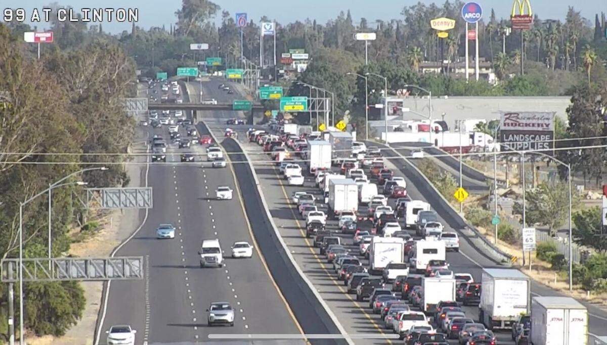 Traffic backs up on Highway 99 in Fresno, California, on Sunday, June 12, 2022, after a shooting on Olive Avenue just off the highway.