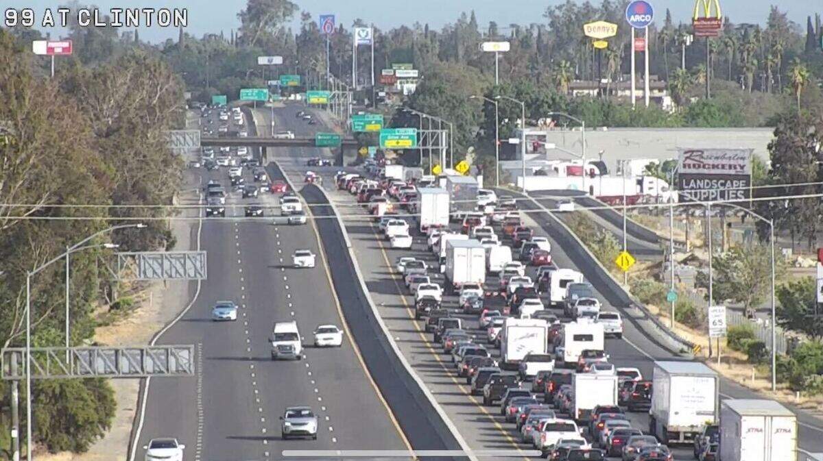 Traffic backs up on Highway 99 in Fresno, California, on Sunday, June 12, 2022, after a shooting on Olive Avenue just off the highway.