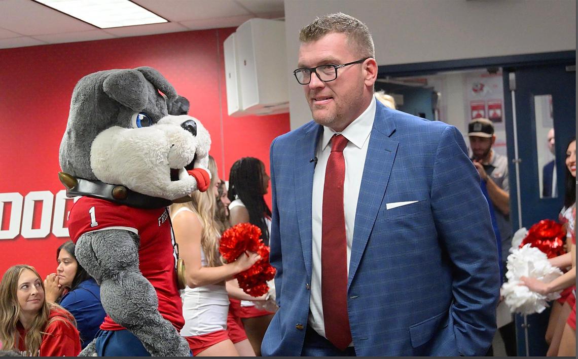Matt Entz, right, enters the Josephine Theater where he was introduced as the new head coach for Fresno State football Thursday, Dec. 5, 2024 in Fresno.