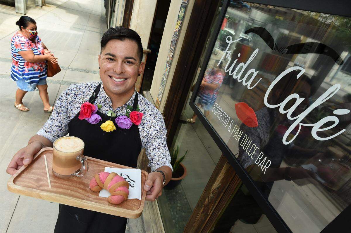 Albee Sánchez, owner of Frida Café, stands outside his coffee shop at Los Panchos restaurant on Fulton Street in downtown Fresno. The cafe has closed, but plans to reopen inside the historic Fresno Water Tower once renovations are complete.