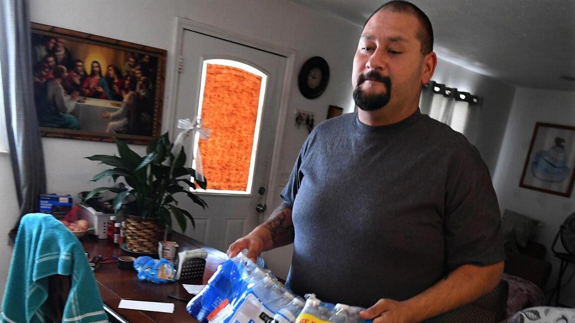 The water is still contaminated. The town is too big for bottled water help from California