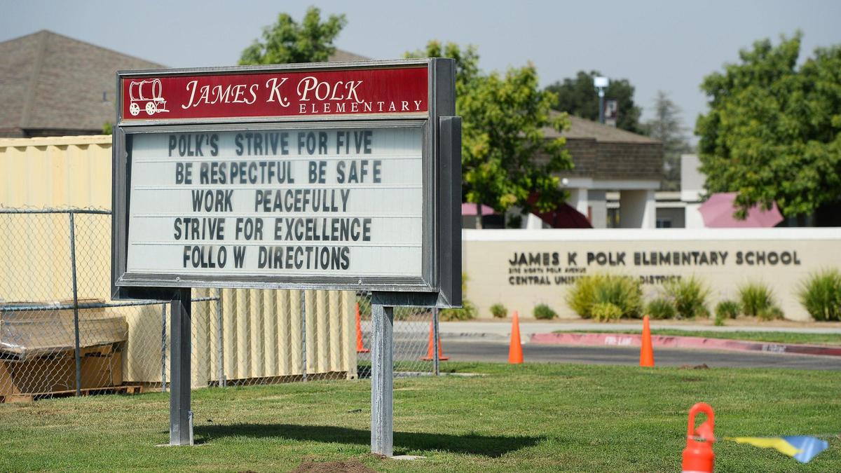 The school sign and marquee photographed at James K. Polk Elementary School in the Central Unified District of Fresno on Thursday, Sept. 16, 2021.