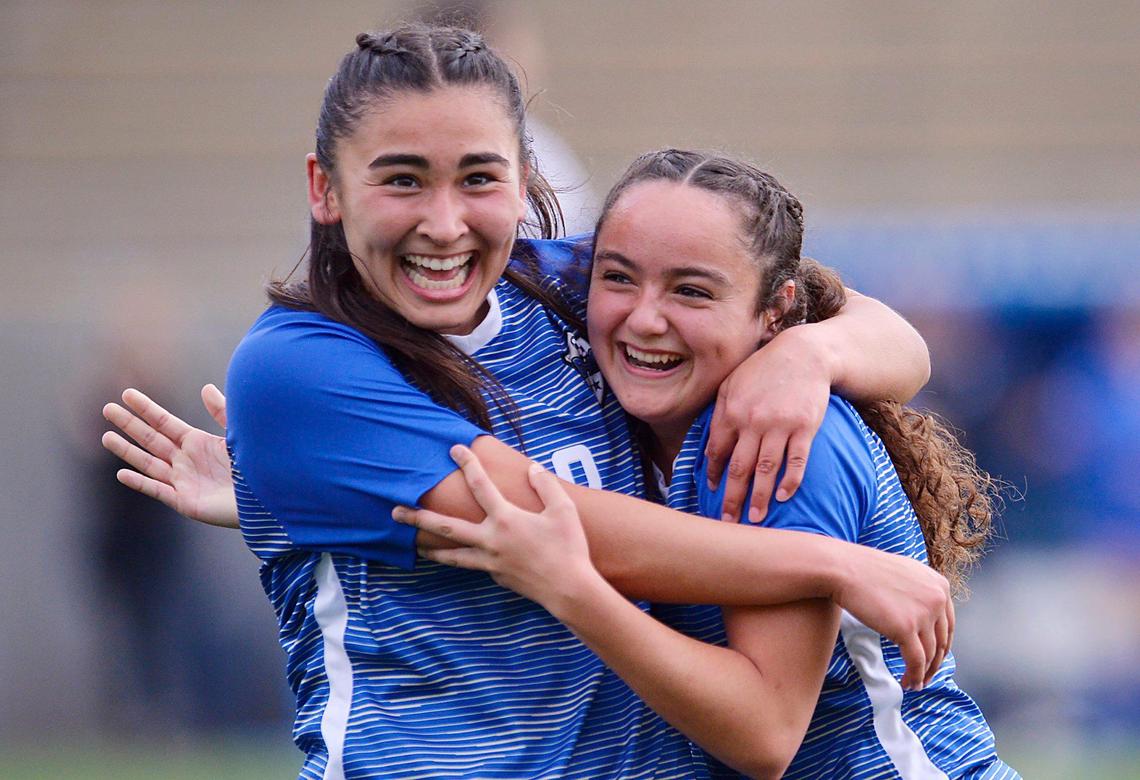 Clovis High’s Samantha Tristan, left, is congratulated by Clovis High’s Tiana Perez, right, for one of Tristan’s two goals in its 2-0 championship game win against Leigh for the CIF Northern California Division II girls soccer final Saturday, March 7, 2020 in Clovis.