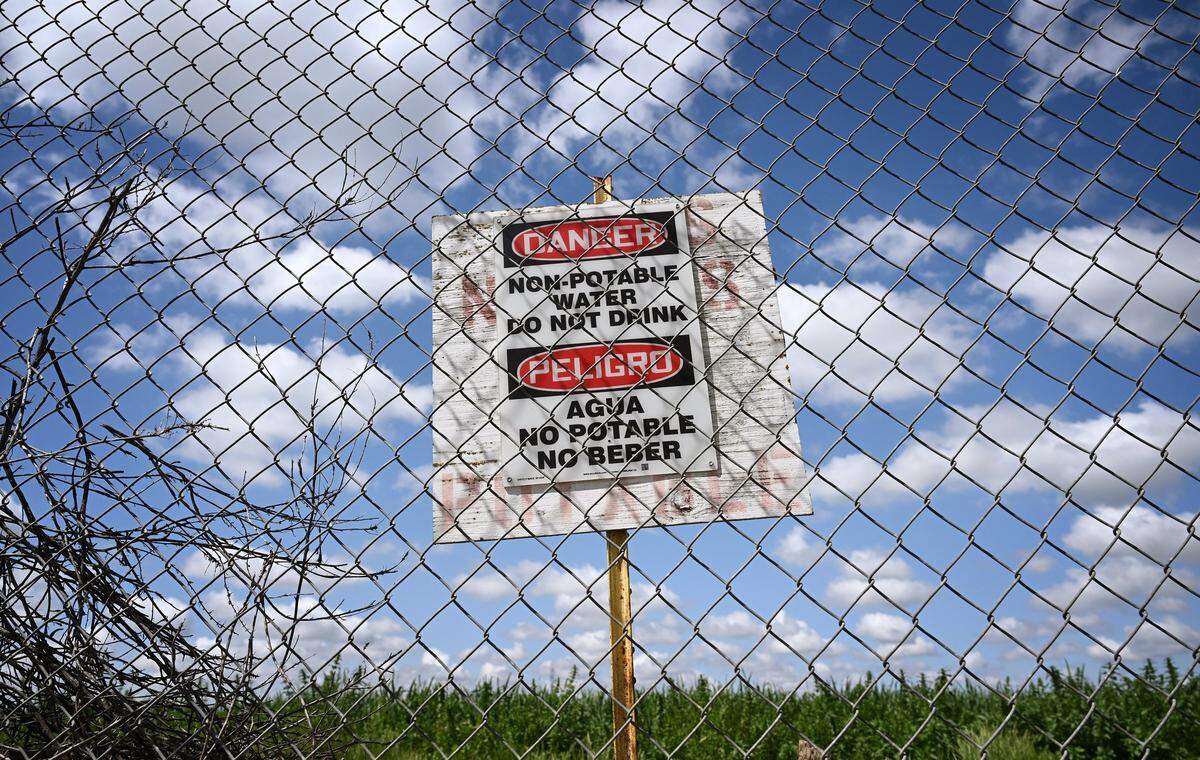The fenced perimeter of Sanger’s industrial waste water treatment plant is seen Thursday, April 3, 3025 just outside of Sanger. The City of Sanger is now working with Pitman Farms in implementing new standards for water usage and treatment.
