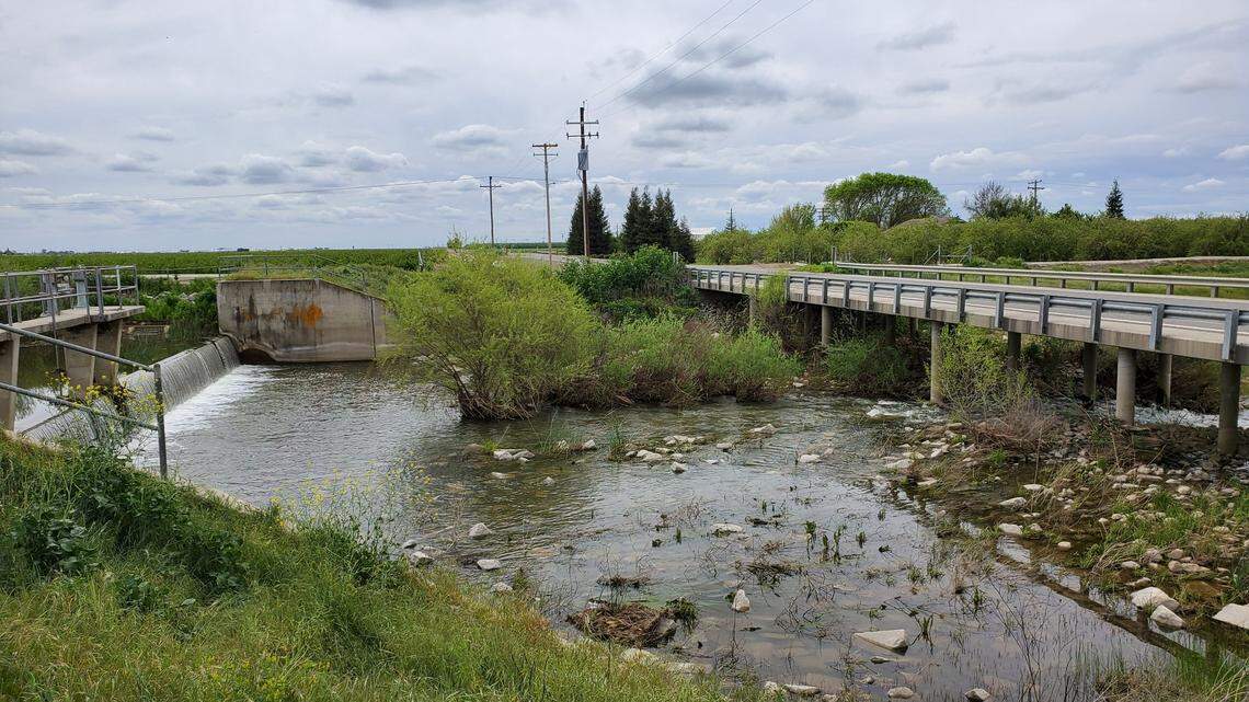 The Fresno River flows under Road 16 in Madera County. The river is the focus of legal wrangling.