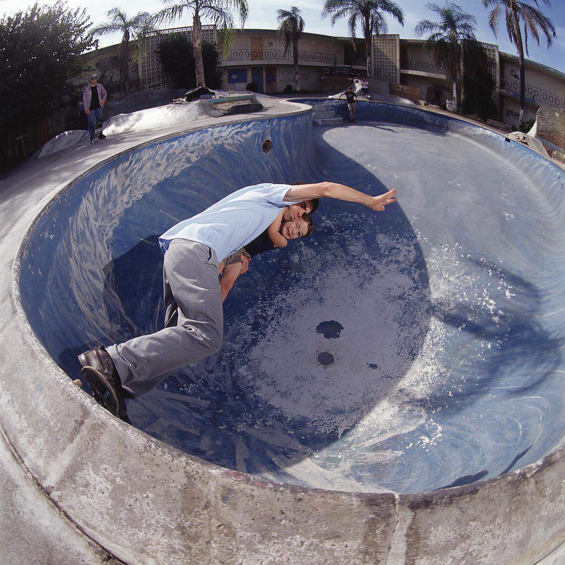 Skateboarder Aaron Gomes rides the Vagabond Pool in Fresno, California, in 2004.