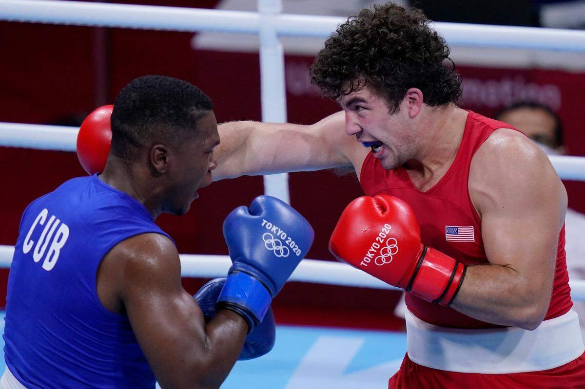 Richard Torrez Jr., from the United States, right, exchanges punches with Cuba’s Dainier Pero during their men’s super heavyweight (over 91 kg) boxing match at the 2020 Summer Olympics, Sunday, Aug. 1, 2021, in Tokyo, Japan.