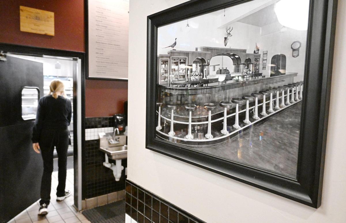 A vintage black and white photograph of the original bar can be seen in Cosmopolitan Tavern & Italian Grill’s current location next to Selland Arena in downtown Fresno. Photographed Friday, Oct. 25, 2024.