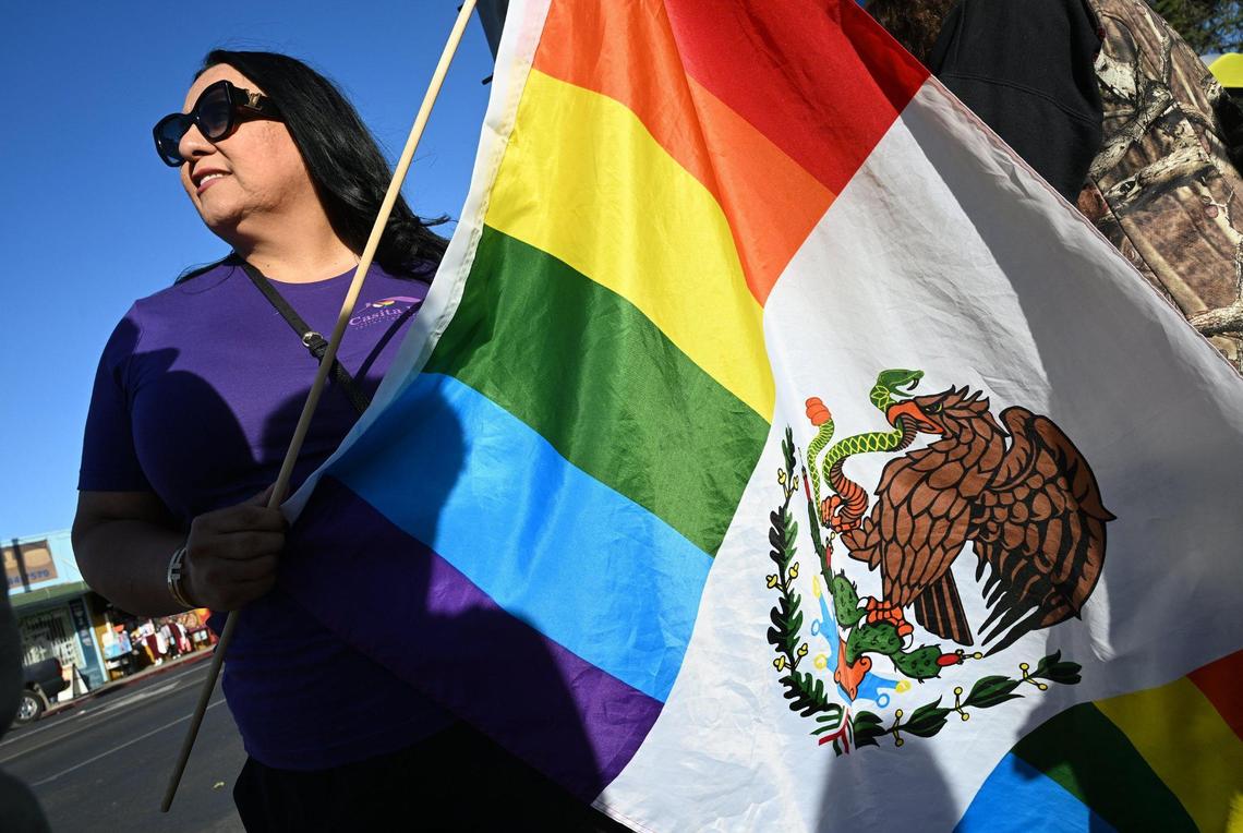 Lady Diana, founder and CEO of Casita Feliz, left, joins a coalition of LGBTQ+ organizations and supporters holding a counter-protest outside Roosevelt Hgh School against a group from Westboro Baptist Church Monday, Oct. 28, 2024, Fresno.
