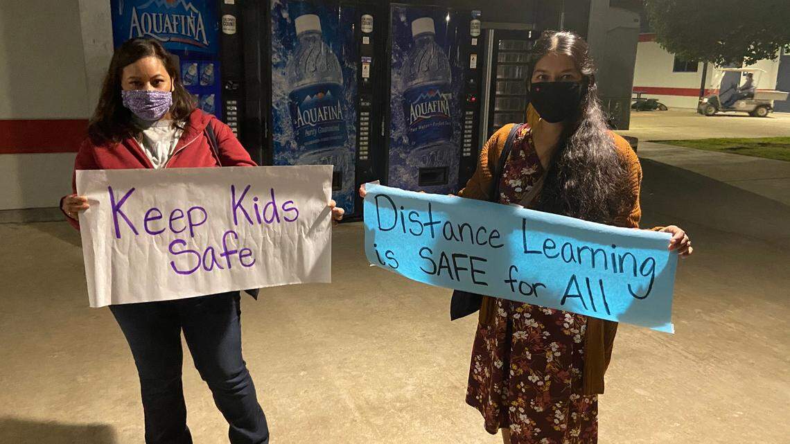 Sanger Unified parent Sandra Velasquez-Wright and Sanger Academy Charter third-grade teacher Delilah Isaak protested to allow teachers and parents the choice to continue distance learning before the school district’s regular board meeting on Oct. 27, 2020.