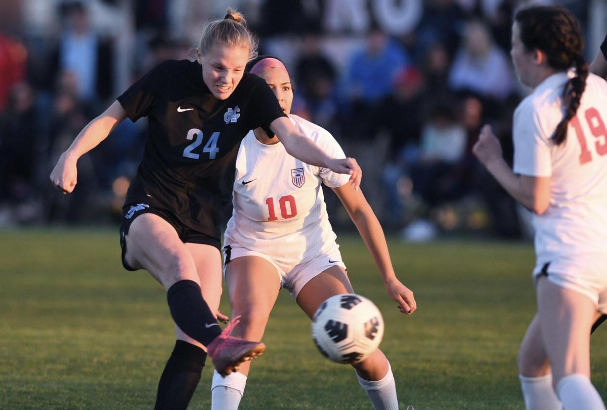 Clovis North’s Sommer Nestman, left, takes a shot against Buchanan in a Tri-River Athletic Conference matchup Thursday, Feb. 9, 2023 in Fresno. Clovis North won 1-0.