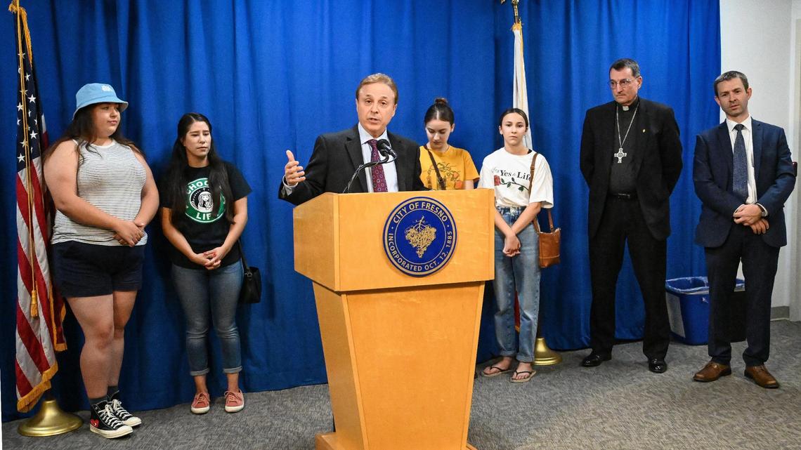 Fresno City Council Member Garry Bredefeld, joined by local faith leaders and right-to-life activists, leads a news conference to call on city leaders to prevent Planned Parenthood Mar Monte from receiving $1 million in state funding in this file photo from Aug. 16, 2022.