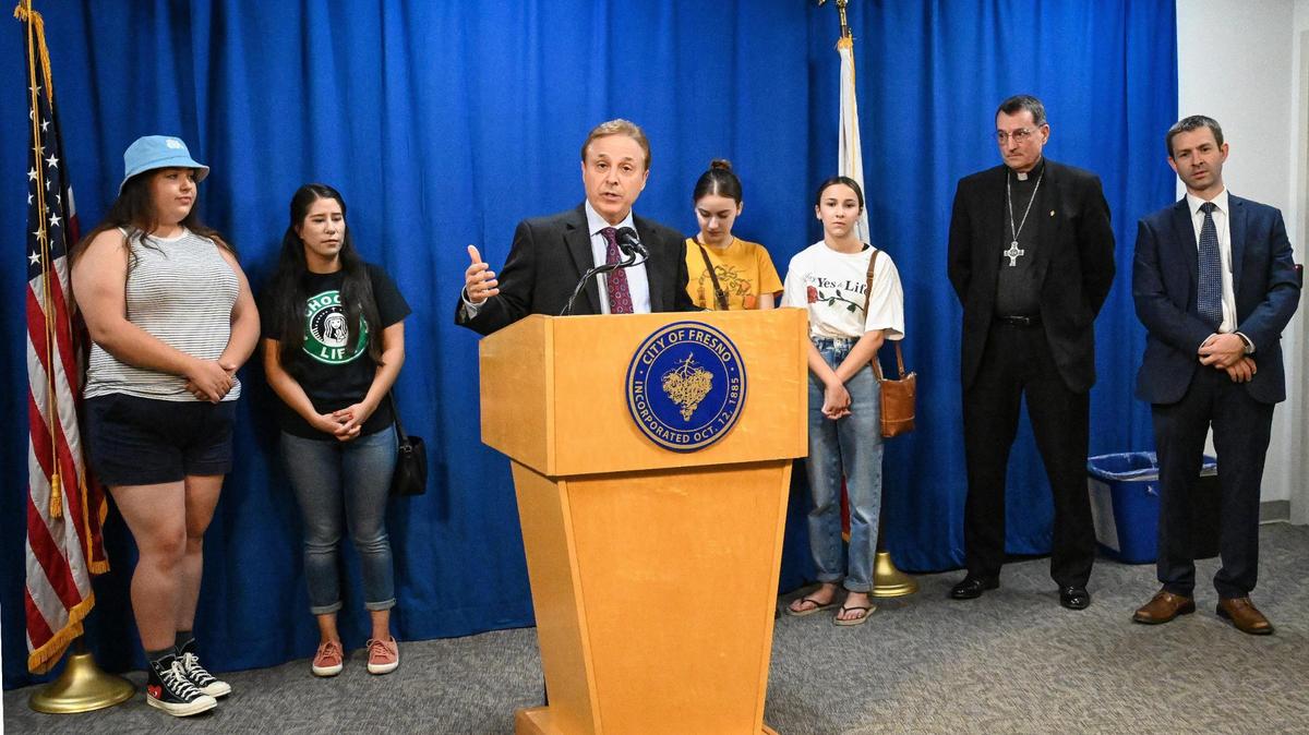 Fresno City Council Member Garry Bredefeld, joined by local faith leaders and right-to-life activists, leads a news conference to call on city leaders to prevent Planned Parenthood Mar Monte from receiving $1 million in state funding in this file photo from Aug. 16, 2022.