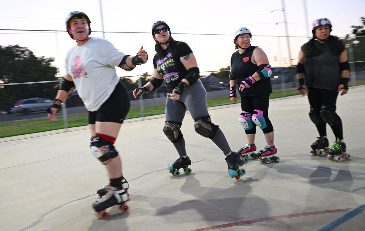 The Ash City Roller Derby team practices at Cary Park on Thursday, May 6, 2025, in Fresno, California.