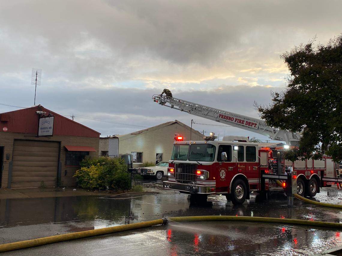 Fresno Fire Department cleans up after a fire destroyed a commercial building on Pine near Maple avenues about 4:30 a.m. Friday, March 22, 2022, according to firefighters.