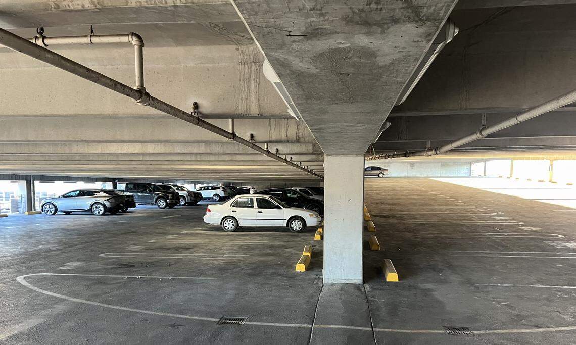 Fewer than two dozen vehicles were parked on the second level of Garage 9, a parking structure owned by the city of Fresno at Van Ness Avenue and Merced Street in downtown Fresno, on Thursday, Jan. 9, 2025. The ground floor along Van Ness Avenue features seven different storefront shops, one of which will be renovated to house some city offices.