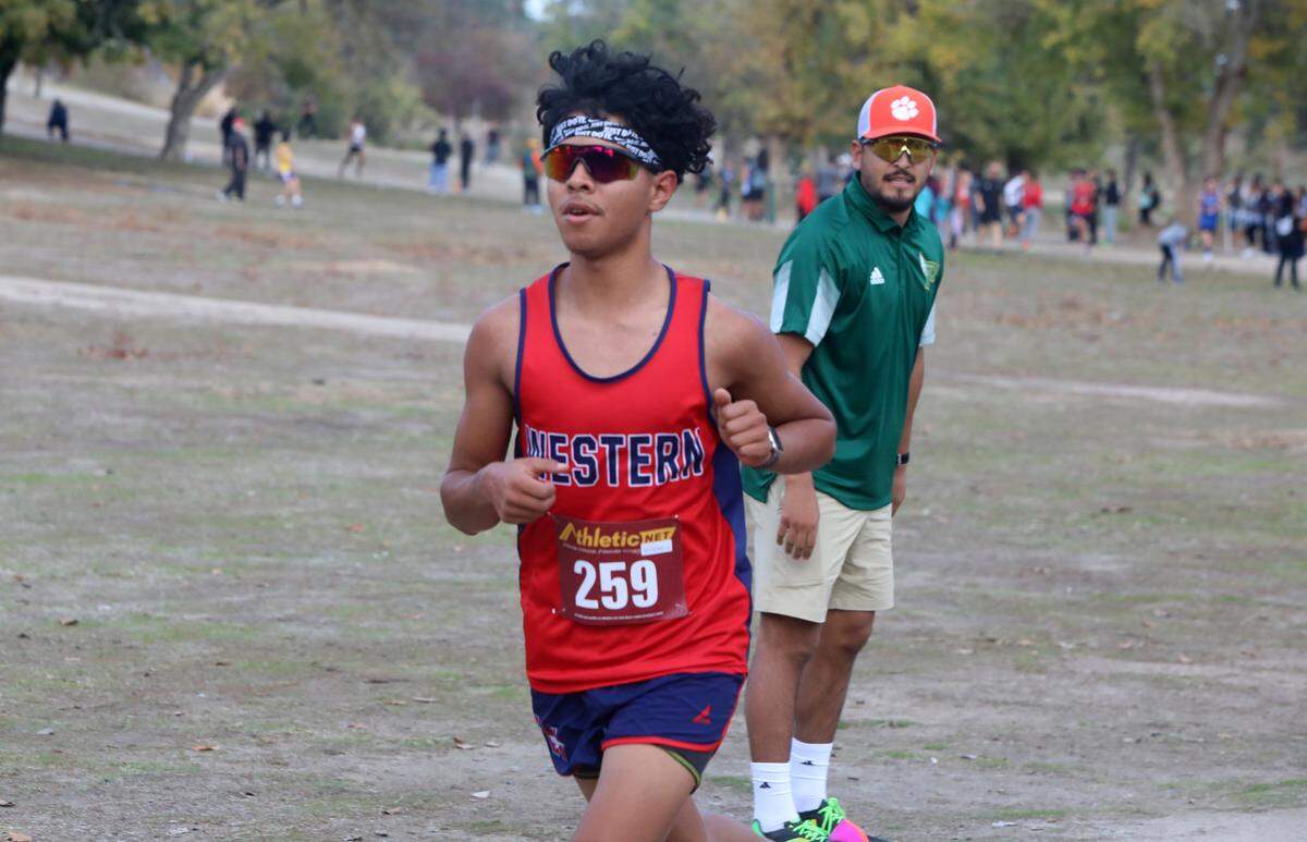 Santiago Basurto of Tulare Western finished fifth (16:32.86) in the CIF Central Section Division II Cross Country Championships at Woodward Park on Nov. 17, 2022. Tulare Western won the team title with 46 points, ahead of Monache’s 86 and Frontier’s 98.