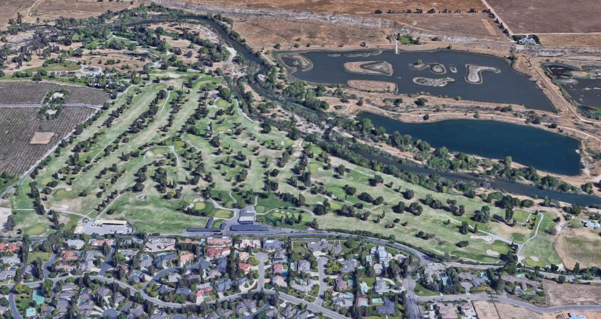 An aerial view from Google Maps looks north at the Fig Garden Golf Club, perched along the south bank of the San Joaquin River. David Knott, CEO of Fig Garden Golf Course Inc. and son of club founder Gordon Knott, closed and sold the course in 2018.