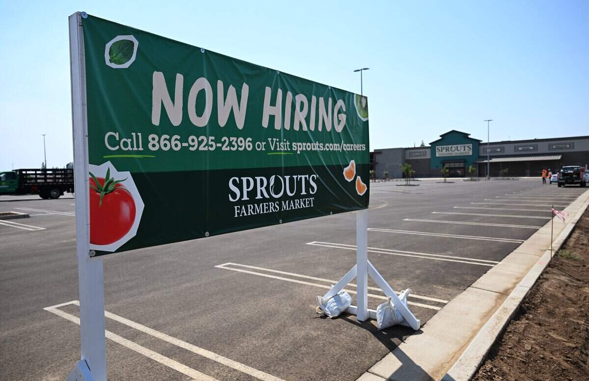 A sign promoting hiring of staff for Sprouts Farmers Market is seen at Fancher Creek Town Center Wednesday, Sept. 3, 2025 in Fresno.