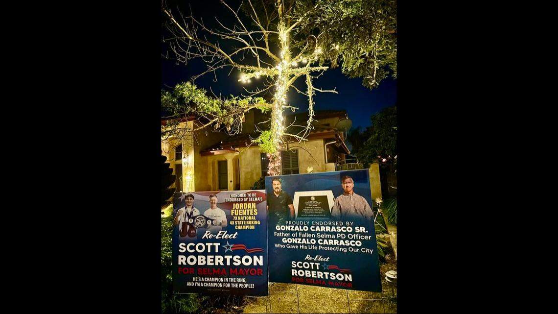 An image shared on Facebook shows a yard sign with the controversial image of Selma Mayor Scott Robertson and Gonzalo Carrasco Sr., the father of Gonzalo Carraso Jr., a Selma officer killed on the job on Jan. 31, 2023.