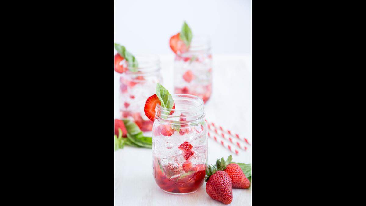 The Farmer’s Daughter is a cocktail made with strawberries and basil invented by K.C. Cornwell, a farmer and founder of The G-Free Foodie, a gluten-free website.