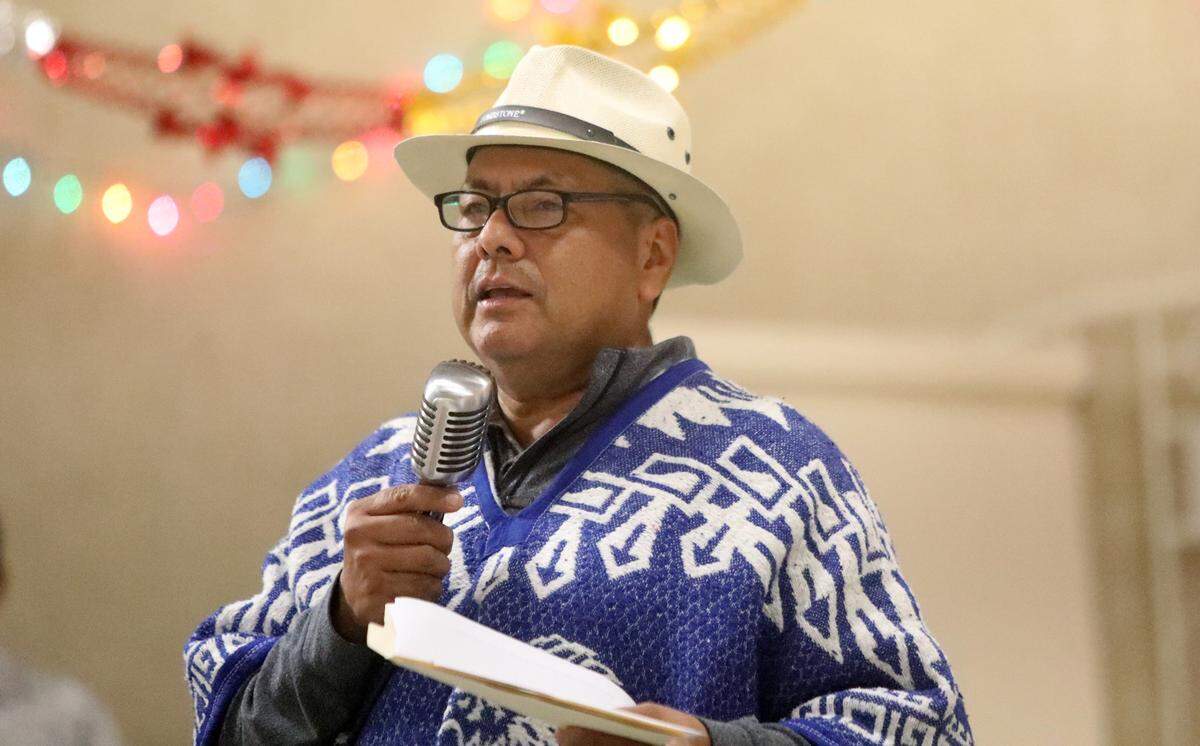 Leonel Flores Bustamante speaks during the posada organized at St. Anthony Mary Claret Church in southeast Fresno on Dec. 18, 2023.