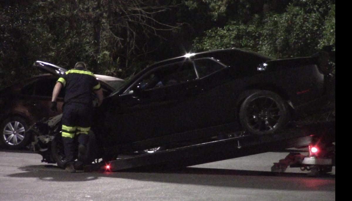 A vehicle is towed after a wanted parolee allegedly rammed another vehicle in Clovis on Wednesday, Jan. 5, 2022.