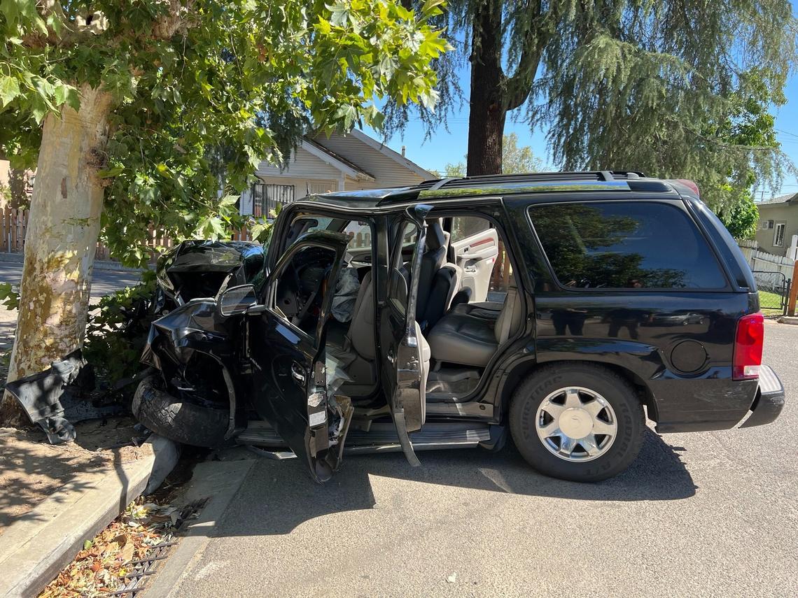 A suspect’s vehicle collides with a tree after a pursuit that ended at the corner of N Street and Annandale Avenue.