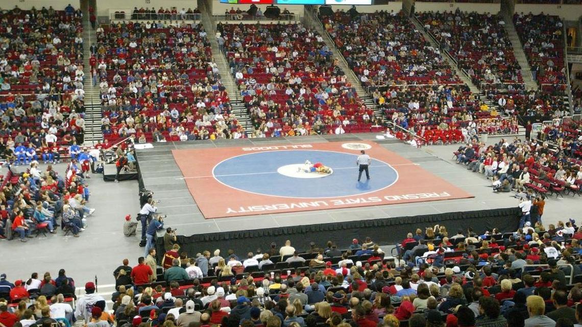 A record crowd watches Fresno State and Iowa State wrestle in the Save Mart Center Tuesday, Jan. 6, 2004.