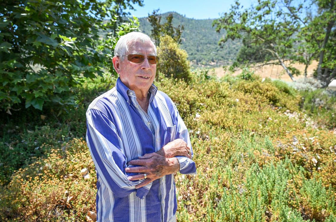 Timothy McCollum enjoys the quiet view from his property in Tollhouse on Thursday, June 12, 2025. Years ago, McCollum left Southern California to find a restful spot away from the big city but still close enough to finish out his career.