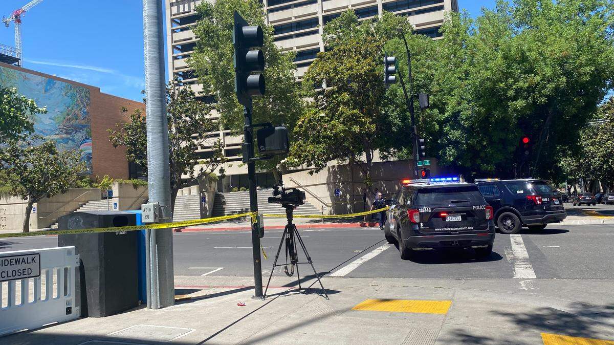 Law-enforcement vehicles block off access Saturday, May 21, 2022, as the Sacramento County Sheriff’s Office investigates a suspicious vehicle found in the main jail parking garage in downtown Sacramento.