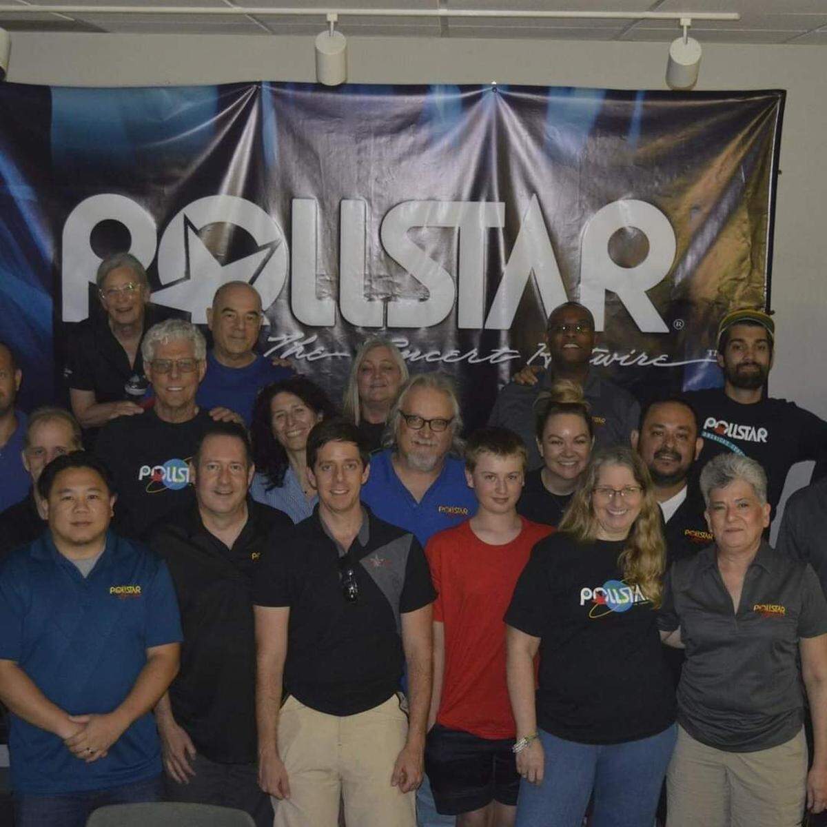 An undated photo submitted by the family of Gary Smith shows employees at Pollstar, the concert industry magazine co-founded by the Smith.