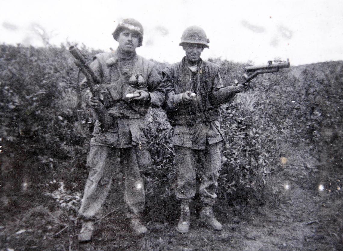 Fred Lopez, left, and his friend Julio "Marty" Martinez in Vietnam in 1968. Lopez was a Marine Corps sergeant during the Vietnam War and survived a severe injury.
