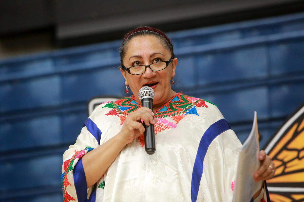 Danzantes Unidos Festival director María Luisa Colmenárez greets dancers and instructors to the 2018 workshops at Clovis East High School.
