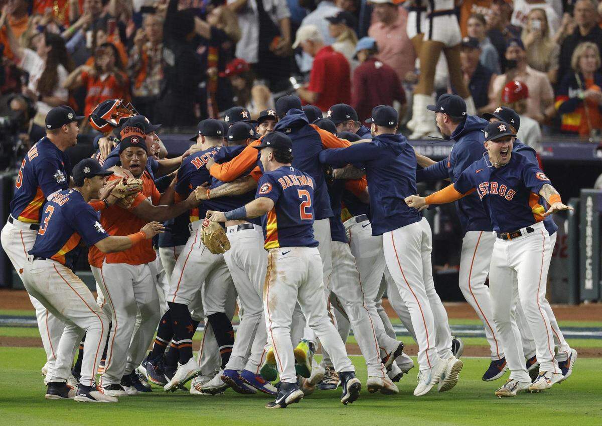 Houston Astros players celebrate after defeating the Philadelphia Phillies in game six to win the World Series at Minute Maid Park in Houston, Texas.