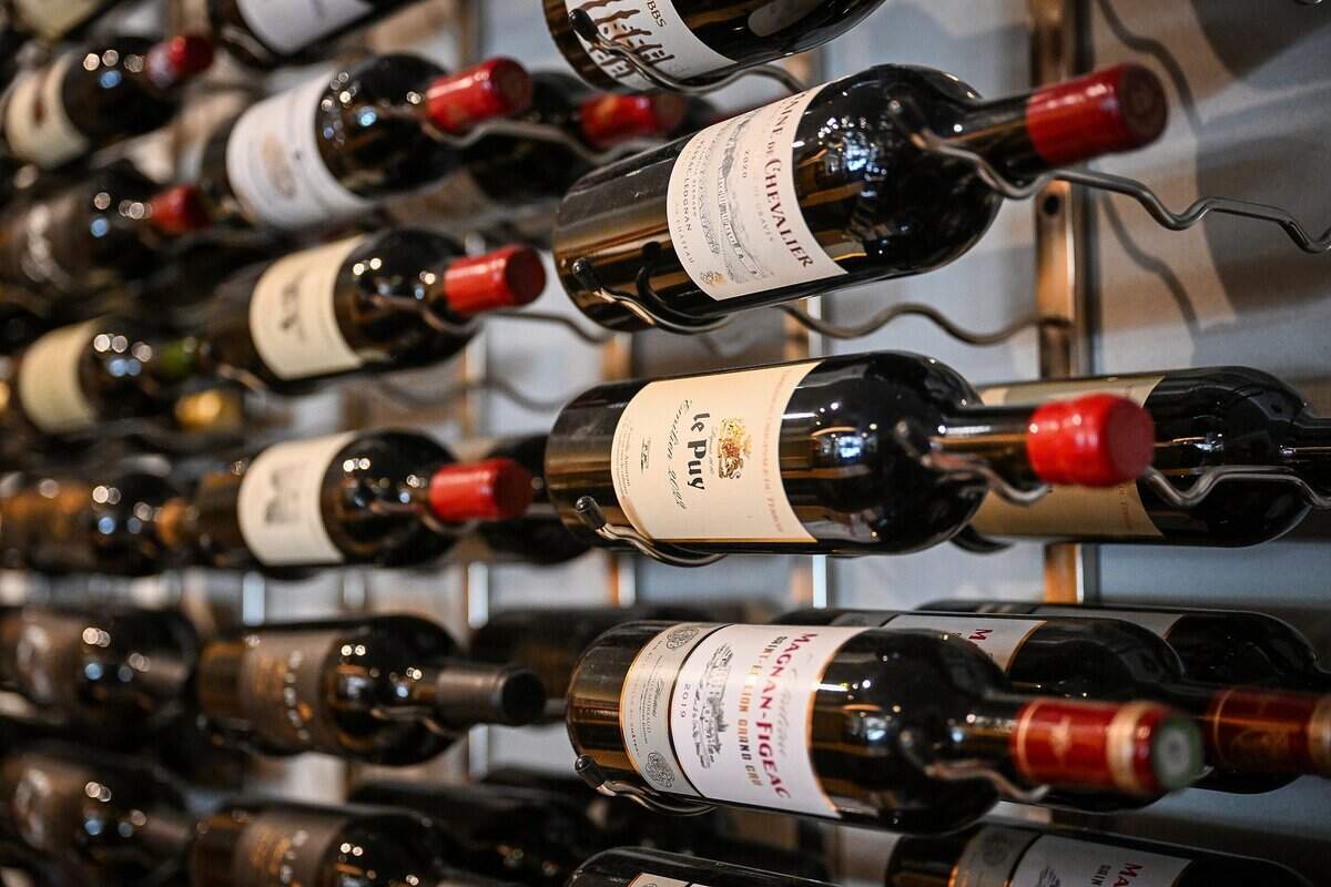 Wines are lie on racks on the wall at Trelio in Old Town Clovis on Monday, June 1, 2026. The boutique restaurant is celebrating 20 years in business.
