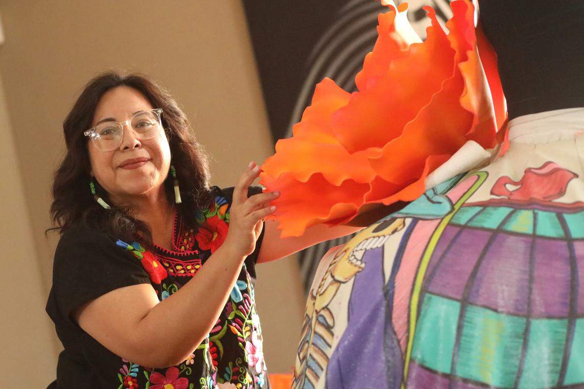 Leticia Valencia has brought La Catrina of Visalia to life for over a decade. She and her husband, Claudio Martínez, create the dresses La Catrina wears each year.