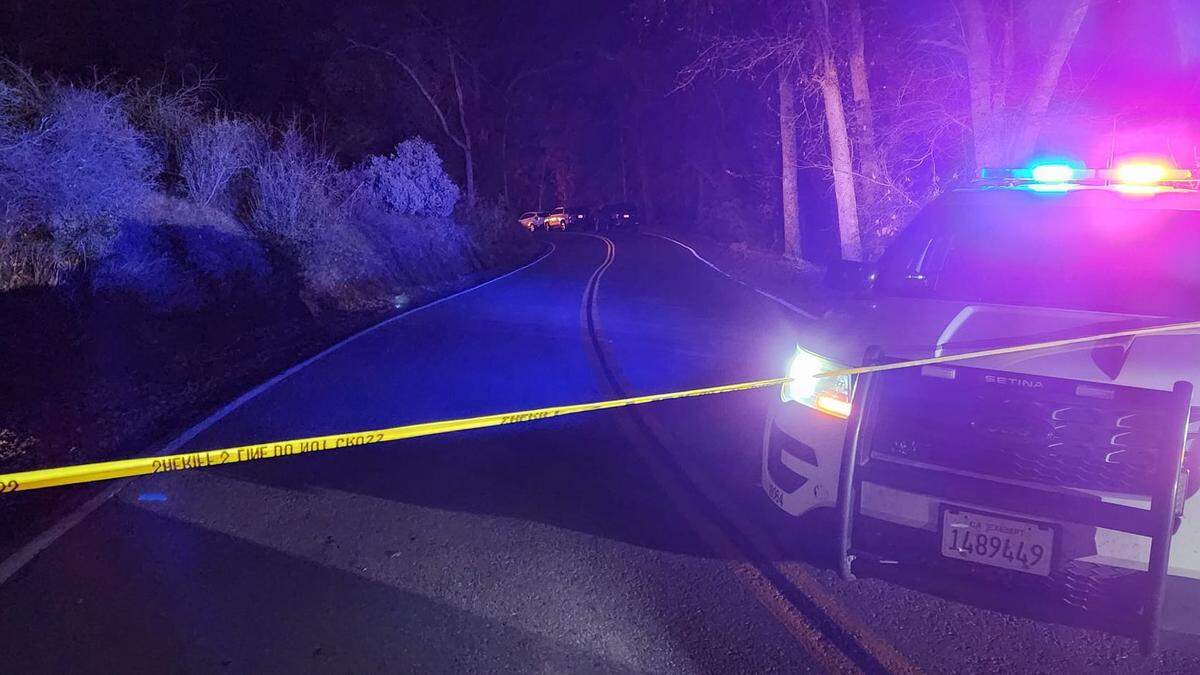 A Fresno County Sheriff’s Office cruiser blocks the road near the 47000 block of Dunlap Road in Miramonte after a double homicide on Wednesday, Dec. 27, 2023, according to deputies.