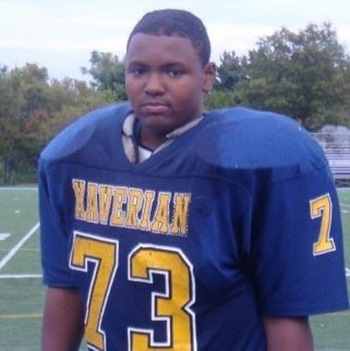 Maurice Hurst Jr. takes a photo for Xaverian Brothers High.