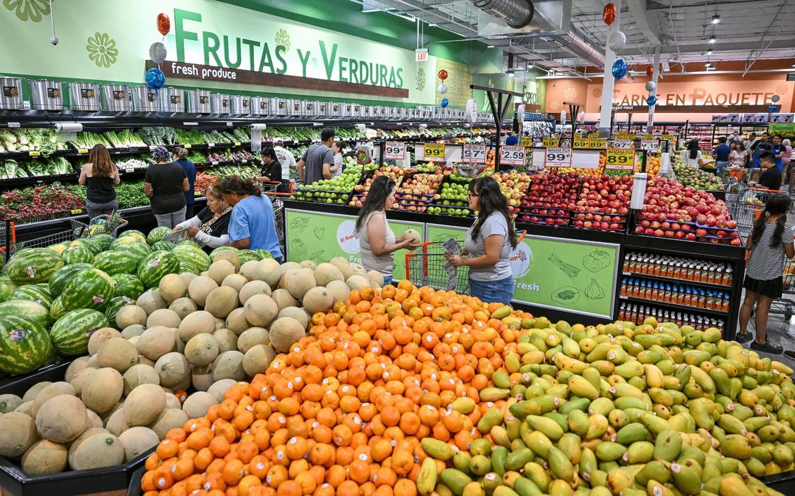 Shoppers go through the produce section of the new El Super supermarket on the north end of Manchester Center in Fresno on Wednesday, June 25, 2025.