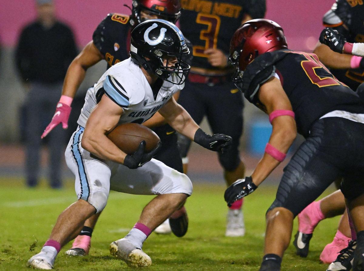 Clovis North’s Jackson Cinfel sees an opening in the Clovis West defense Friday, Oct. 13, 2023, in Clovis. Final score, Clovis North 34, Clovis West 27.