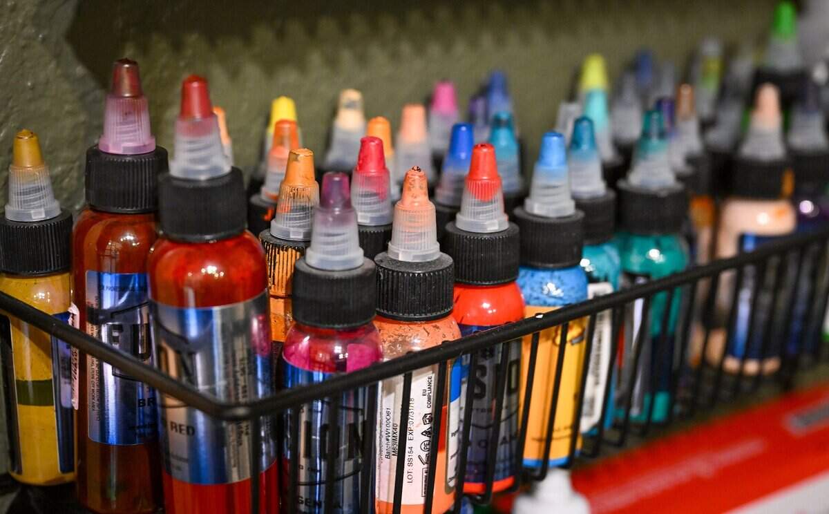 Inks sit on a rack in Daniel Rudolfo Acosta III's tattoo parlor in Clovis on Monday, June 29, 2026. Acosta, who opened Clovis Ink Tattoo, the first tattoo parlor in Clovis, 19 years ago, wrote a book on his experience as a tattoo artist called Kings of Flesh.