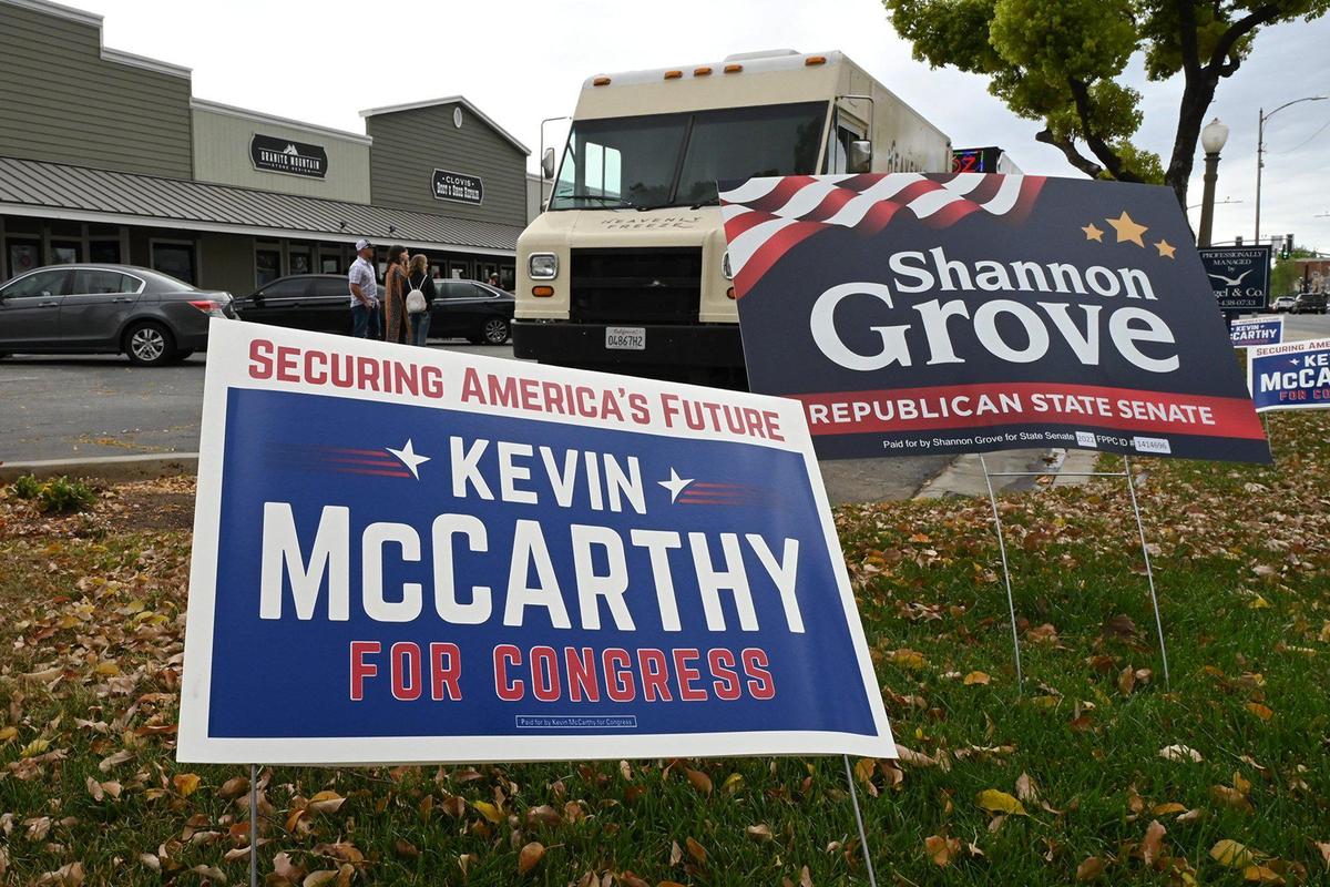Signs at the corner of Clovis Avenue and Third Street mark Congressman Kevin McCarthy’s new headquarters Saturday, March 19, 2022 in downtown Clovis.