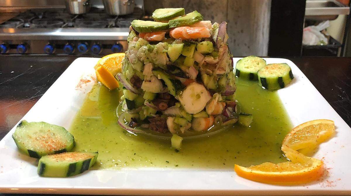 The seafood tower at Sabores features shrimp, octopus, fish and avocado.